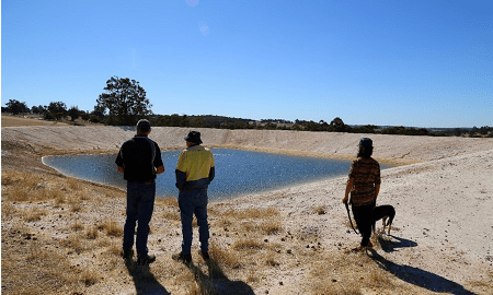 Dr Richard George from the WaterSmart Dams project (left), with farmer and grower group representatives at a West Kojonup farm dam, discussing how decreasing runoff is reducing dam effectiveness.  Photo credit: Associate Professor Nik Callow, The University of Western Australia.