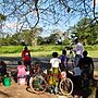 Edited photo by Jelle Maas: women alongside the road