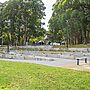A park with stairs and benchesAI-generated content may be incorrect.