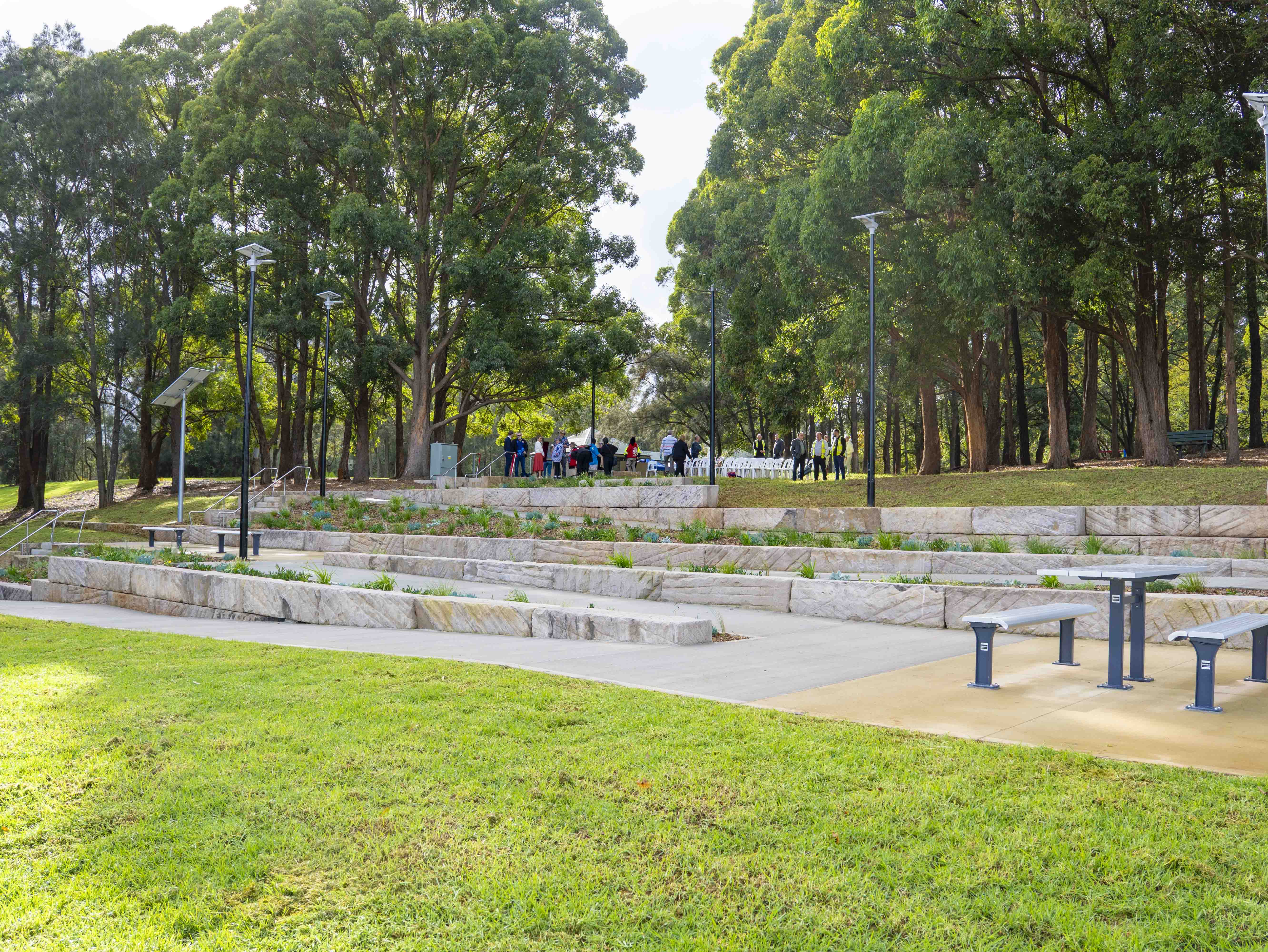 A park with stairs and benchesAI-generated content may be incorrect.