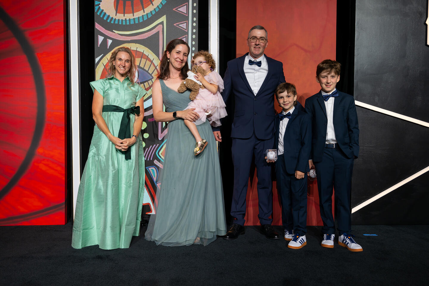 Courtney Kraus, left, with the Cowell Murray family