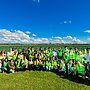 Delegates from 12 countries in a field as part of 2025 Reverse Trade Mission. Image courtesy of AUSVEG.