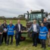 Minister Dimopoulos and Member for Glen Waverley John Mullahy post with the local Parks Victoria team