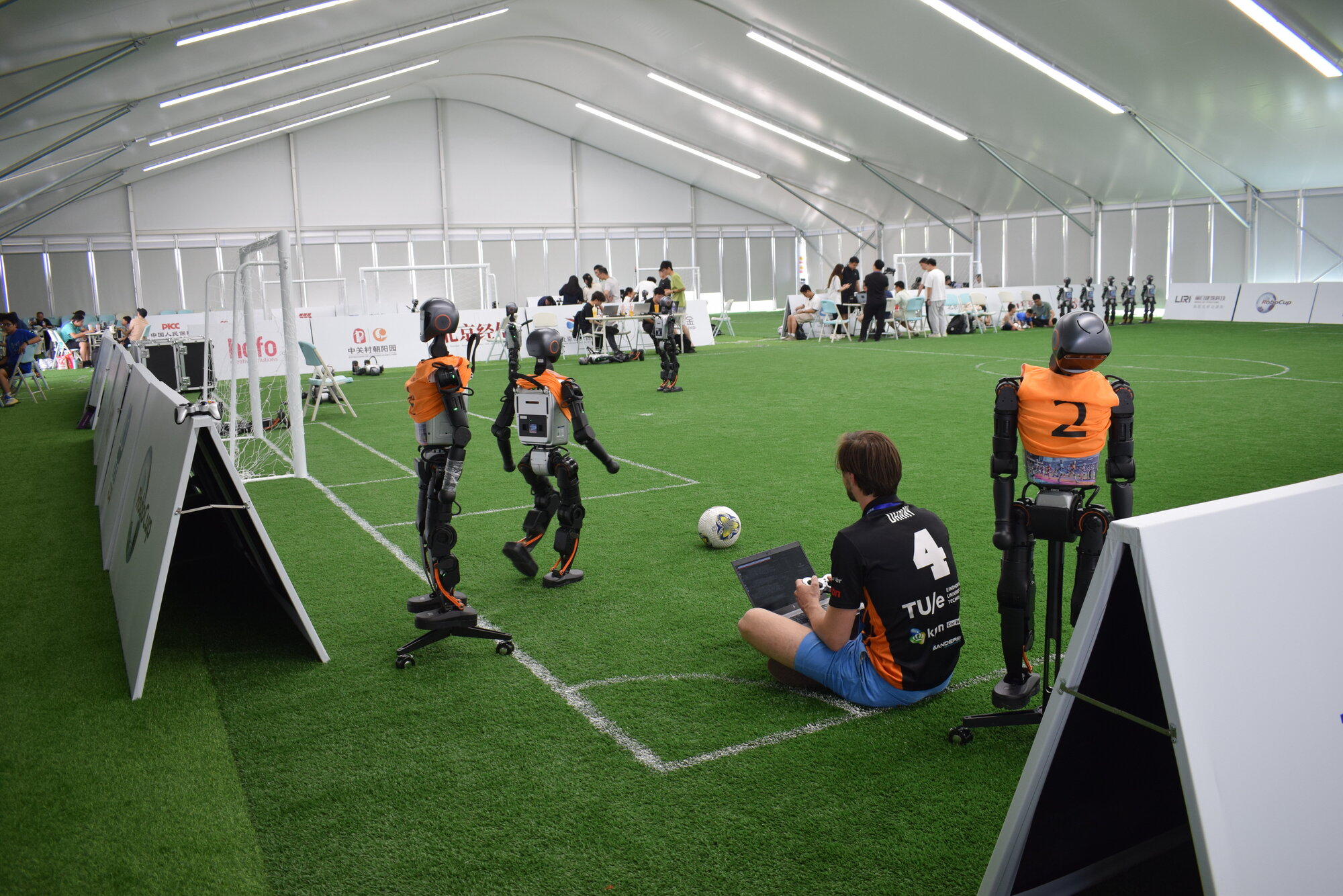 World Champion Robot Soccer Switches to Legs