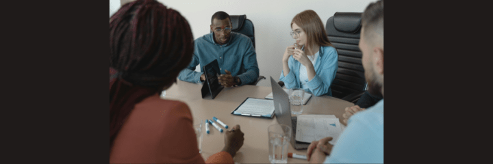 Researchers at a business meeting